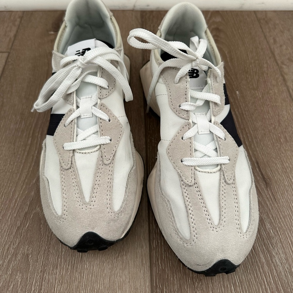 New Balance 327 sneakers in black on white